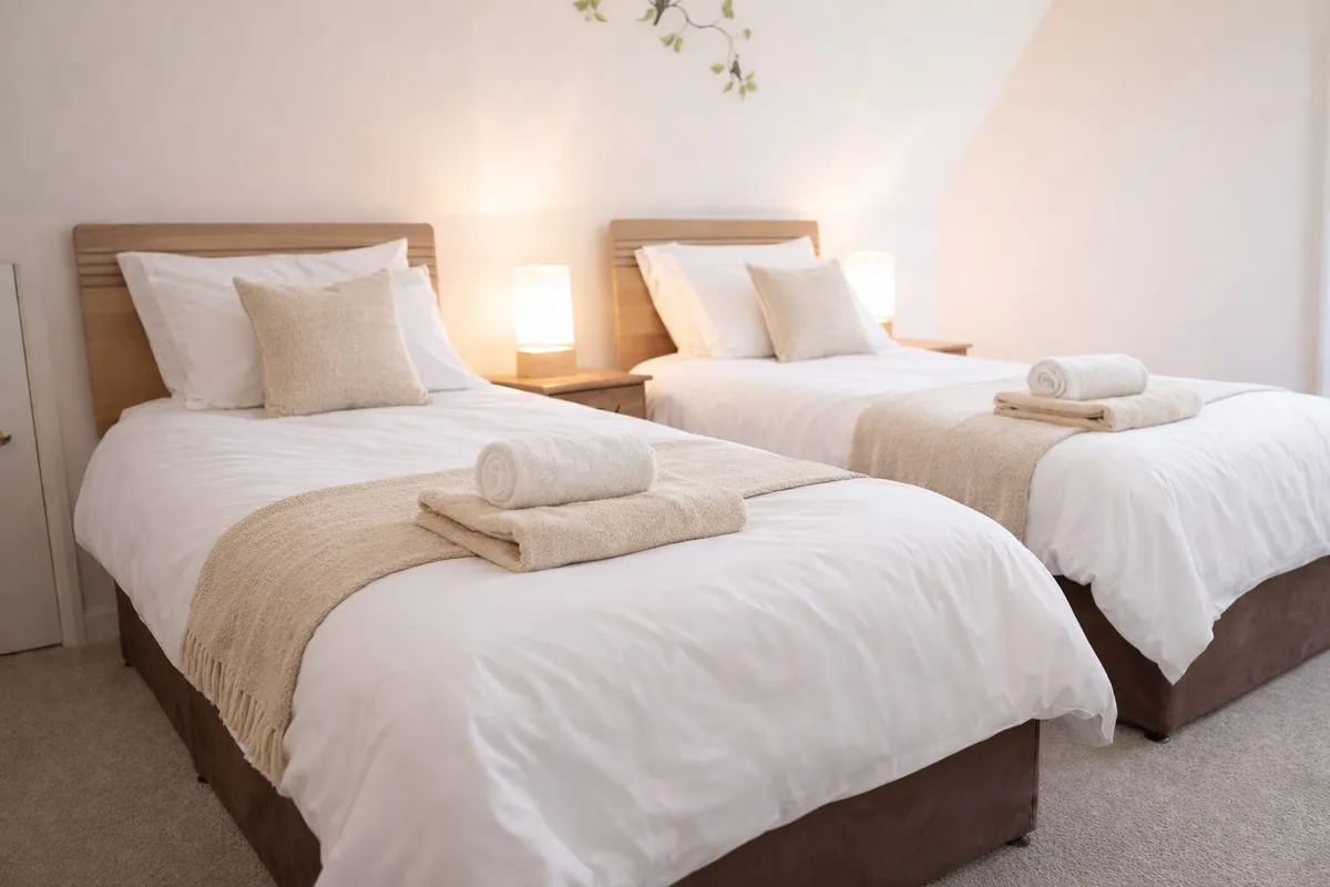 The Coastal Rose twin bedroom at the retreat house on Sark