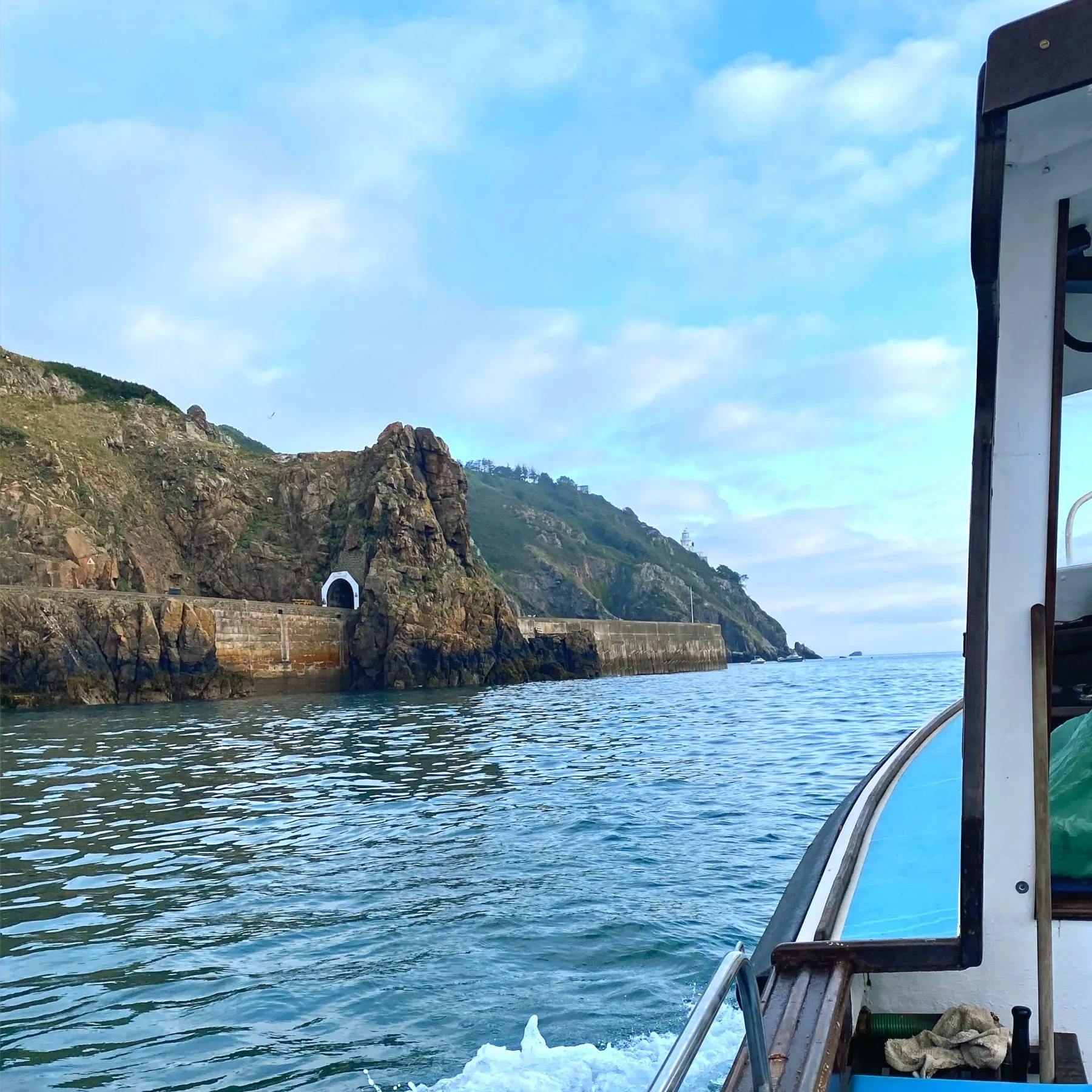 The boat crossing to Sark past the island cliffs, Channel Islands