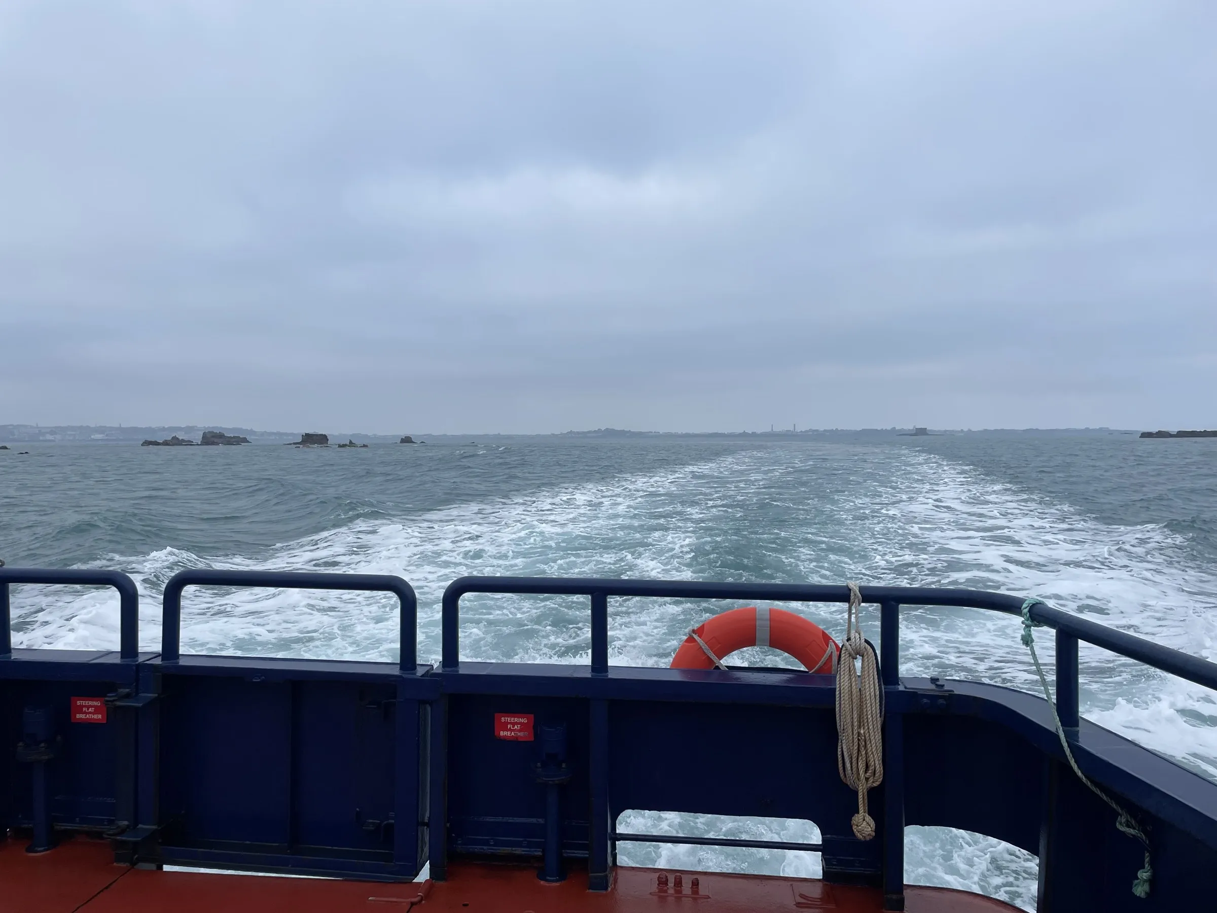The wake of the ferry running back toward Guernsey on the crossing to Sark, Channel Islands