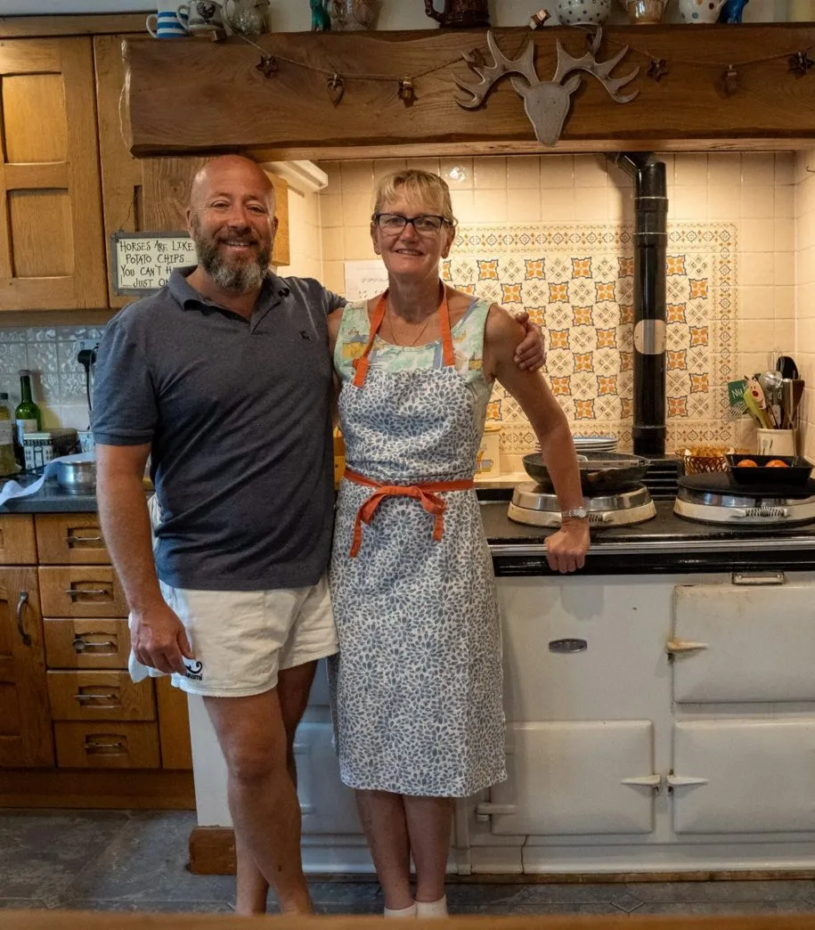 Helen and Alex in the kitchen of the retreat house on Sark