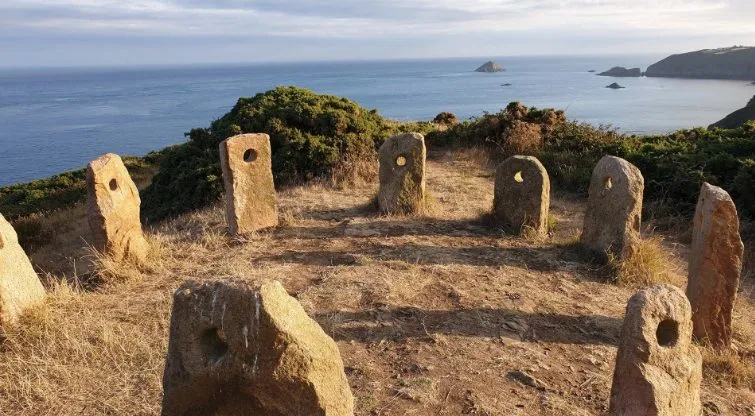 Sark Henge standing stones at dusk, a stargazing spot on the Dark Sky Island of Sark