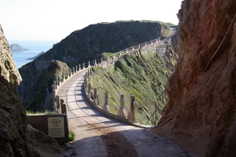 The concrete roadway across La Coupée joining Sark and Little Sark, Channel Islands