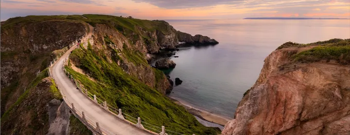 La Coupée at sunset, the narrow land bridge joining Sark and Little Sark