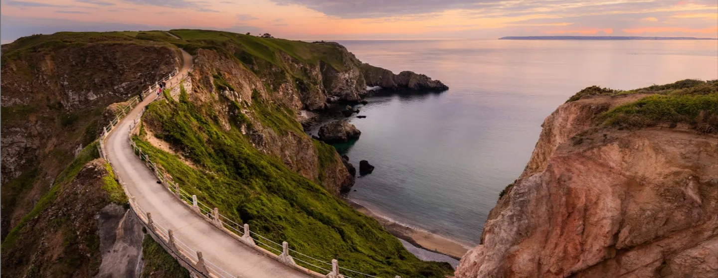 La Coupée at sunset, the narrow land bridge joining Sark and Little Sark