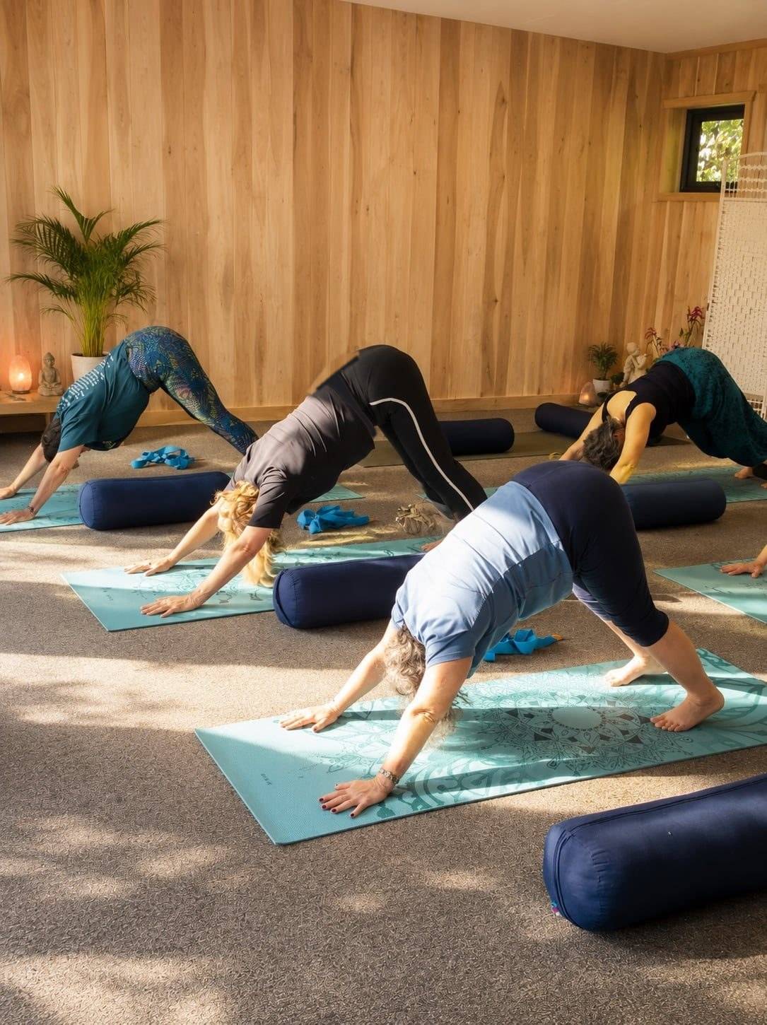 Small group yoga practice at a retreat on Sark, Channel Islands