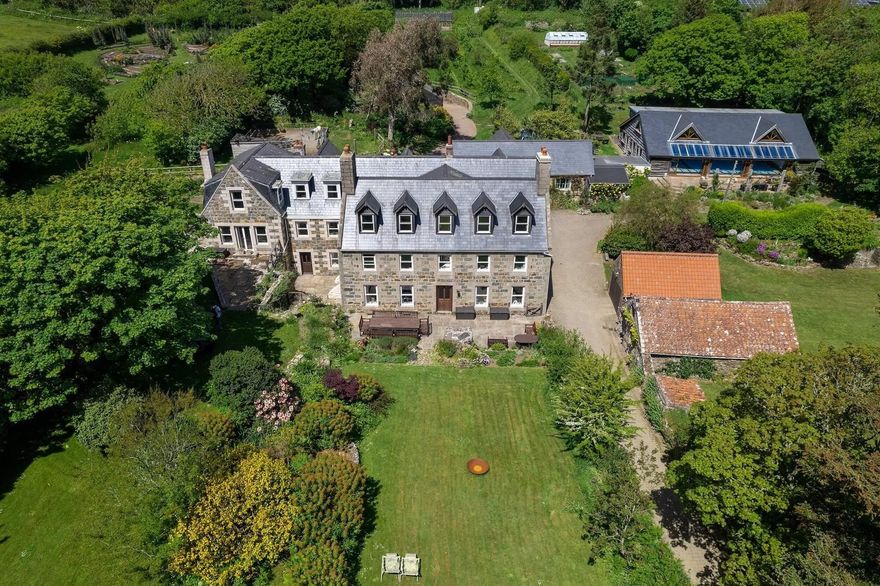 Aerial view of the retreat house and gardens on Sark, Channel Islands